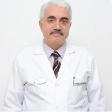 Prof. Dr. Ahmet Gödekmerdan — Pratisyen. Portre fotoğrafı.