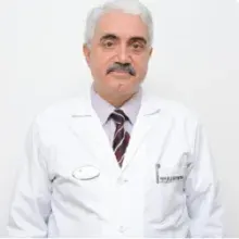 Prof. Dr. Ahmet Gödekmerdan — Pratisyen. Portre fotoğrafı.