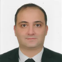 Uzm. Dr. Serkan Akkoyunlu — Psikiyatri, Çankaya, Ankara. Portre fotoğrafı.