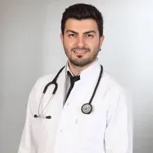 Dr. Hüseyin Bayram — Genel Cerrahi, İzmir. Portre fotoğrafı.