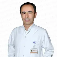 Uzm. Dr. Ahmet Dinç — Fiziksel Tıp Ve Rehabilitasyon, Kocaeli. Portre fotoğrafı.
