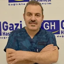 Op. Dr. Nuh Gümüştekin — Kadın Hastalıkları Ve Doğum, İstanbul. Portre fotoğrafı.