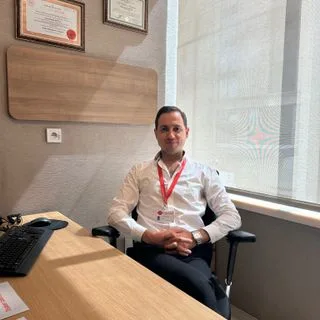 Op. Dr. Enes Burak Mutlu — Kadın Hastalıkları Ve Doğum, Gaziosmanpaşa, İstanbul. Portre fotoğrafı.