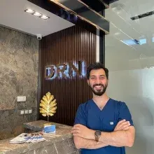 Dt. Ahmet Özgür — Diş Hekimi, Ankara. Portre fotoğrafı.