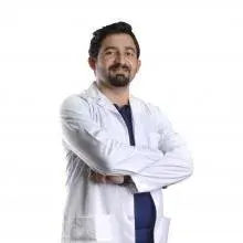 Dr. Dt. Kemal Solmaz — Ortodonti, Konya. Portre fotoğrafı.