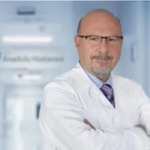 Uzm. Dr. Murat Kadıoğlu — Kadın Hastalıkları Ve Doğum, Bursa. Portre fotoğrafı.