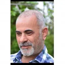 Dt. Kemal Kutlutürk — Diş Hekimi, Malatya. Portre fotoğrafı.