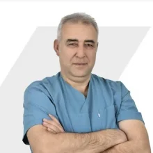Dt. Nuri Karaca — Diş Hekimi, Muğla. Portre fotoğrafı.