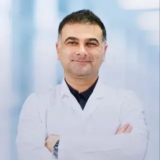 Uzm. Dr. Gökhan Bulut — Radyoloji, İzmir. Portre fotoğrafı.