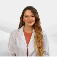 Uzm. Dr. Tuğçe Cansu Şahin — Çocuk ve Ergen Psikiyatrisi, Antalya. Portre fotoğrafı.