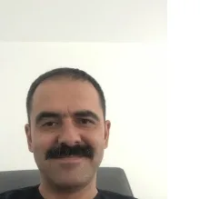Dt. Cenk Celep — Diş Hekimi, Uşak. Portre fotoğrafı.