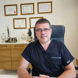 Prof. Dr. Kemal Özerkan — Kadın Hastalıkları Ve Doğum, Nilüfer, Bursa. Portre fotoğrafı.