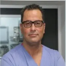 Prof. Dr. Sırrı Sinan Bilgin — El Cerrahisi, Ankara. Portre fotoğrafı.