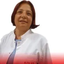 Op. Dr. Mine Kanmaz Süthan — Kadın Hastalıkları Ve Doğum. Portre fotoğrafı.