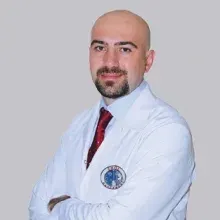 Op. Dr. Arif Aydın — Plastik Rekonstrüktif Ve Estetik Cerrahi, Çiğli, İzmir. Portre fotoğrafı.