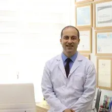 Dr. Dt. Tekin Özlü — Trabzon. Portre fotoğrafı.