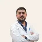 Op. Dr. Ali Özkömeç — Genel Cerrahi, İstanbul. Portre fotoğrafı.