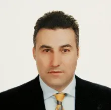 Dr. Dt. Ali Palalı — Bursa. Portre fotoğrafı.