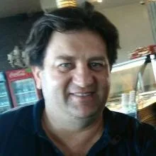 Prof. Dr. Hasan Babacan — Denizli. Portre fotoğrafı.