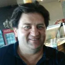 Prof. Dr. Hasan Babacan — Denizli. Portre fotoğrafı.