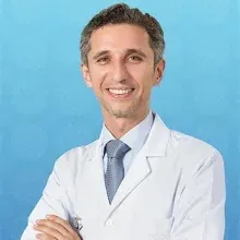 Doç. Dr. Hayrettin Temel — Çocuk Sağlığı Ve Hastalıkları, İstanbul. Portre fotoğrafı.