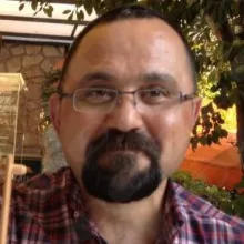 Uzm. Dr. Semih Dikkatli — Psikiyatri, Ankara. Portre fotoğrafı.