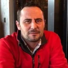Prof. Dr. Oğuz Güçlü — Kulak Burun Boğaz, Çanakkale. Portre fotoğrafı.