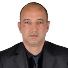 Prof. Dr. Hüseyin Tuğsan Ballı — Radyoloji, Seyhan, Adana. Portre fotoğrafı.