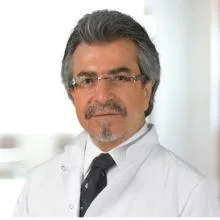 Uzm. Dr. Kenan Önder — Çocuk Sağlığı Ve Hastalıkları, Adana. Portre fotoğrafı.