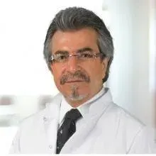 Uzm. Dr. Kenan Önder — Çocuk Sağlığı Ve Hastalıkları, Adana. Portre fotoğrafı.