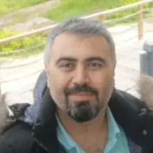 Doç. Dr. Yılmaz Akbaş — Çocuk nörolojisi, Hatay. Portre fotoğrafı.