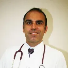Doç. Dr. Barış Güven — Çocuk Kardiyolojisi, Konak, İzmir. Portre fotoğrafı.