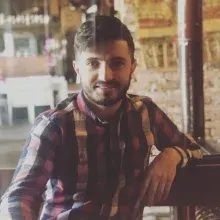 Dt. Burhan Temel — Diş Hekimi, Bursa. Portre fotoğrafı.