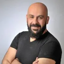 Doç. Dr. Cüneyt Ünsal — Psikiyatri, İstanbul. Portre fotoğrafı.