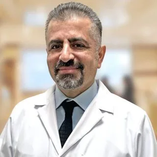 Doç. Dr. Oğuzhan Babacan — İstanbul. Portre fotoğrafı.