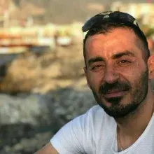 Psk. Murat Ektiren — Psikoloji, İzmir. Portre fotoğrafı.