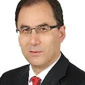 Prof. Dr. Tezer Kutluk — Çocuk Sağlığı Ve Hastalıkları, Beylikdüzü, İstanbul. Portre fotoğrafı.
