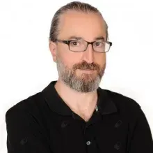 Uzm. Dr. Başar Akman — Psikiyatri, Bakırköy, İstanbul. Portre fotoğrafı.