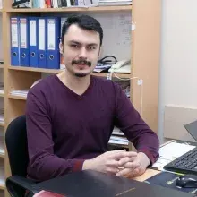 Uzm. Dr. Hüseyin Tolga Acar — Spor Hekimliği. Portre fotoğrafı.