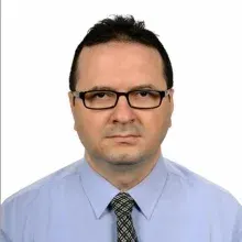 Prof. Dr. Metin Kement — İstanbul. Portre fotoğrafı.