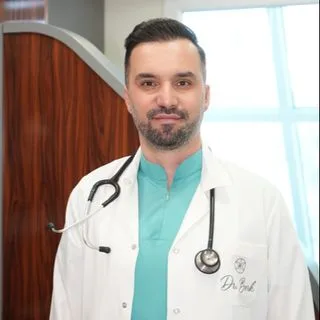 Uzm. Dr. İsmet Anıl Berk — İç Hastalıkları, Nevşehir. Portre fotoğrafı.