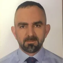 Doç. Dr. Devrim Bozkurt — Bornova, İzmir. Portre fotoğrafı.