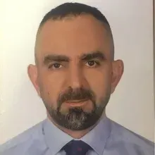 Doç. Dr. Devrim Bozkurt — Bornova, İzmir. Portre fotoğrafı.