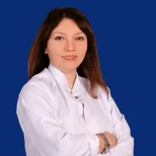 Op. Dr. Emine Karabük — Kadın Hastalıkları Ve Doğum, Küçükçekmece, İstanbul. Portre fotoğrafı.
