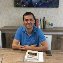 Uzm. Dr. Ömer Kocael — Çocuk ve Ergen Psikiyatrisi, Bursa. Portre fotoğrafı.