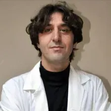 Doç. Dr. Abdullah Ülkü — Genel Cerrahi, Adana. Portre fotoğrafı.