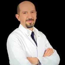 Prof. Dr. Emre Bozkırlı — Endokrinoloji Ve Metabolizma Hastalıkları, Adana. Portre fotoğrafı.