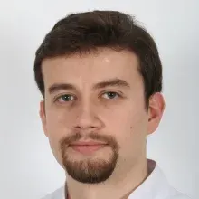 Dr. Dt. Mücahid Şahin — Bursa. Portre fotoğrafı.