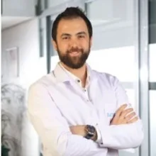 Op. Dr. Murat Direl — Göz Hastalıkları, Balçova, İzmir. Portre fotoğrafı.
