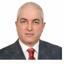 Prof. Dr. Oğuz Koç — Genel Cerrahi, Bakırköy, İstanbul. Portre fotoğrafı.